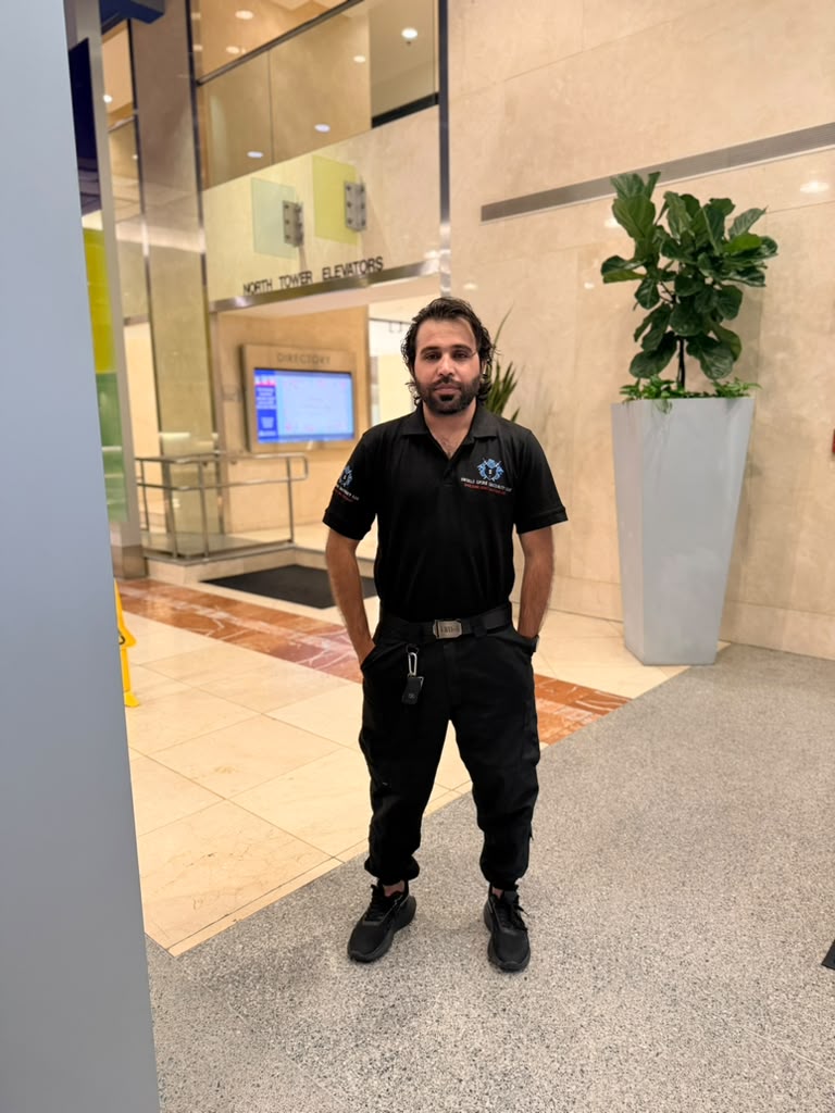 Shield Spire Security officer providing event security coverage inside a Downtown Austin technology event venue lobby.