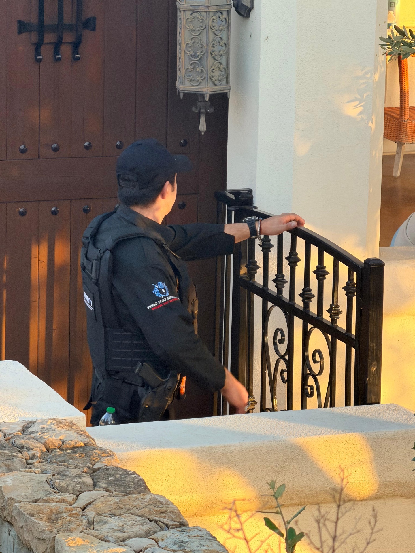 Supervision & Team Coordination – field supervisor managing access at the residence gate.