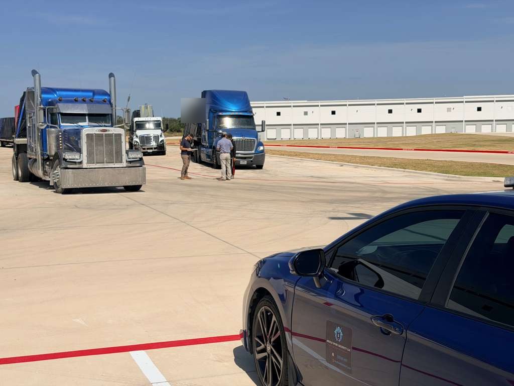 Observation of authorized transport activity in the facility yard during daytime operations.