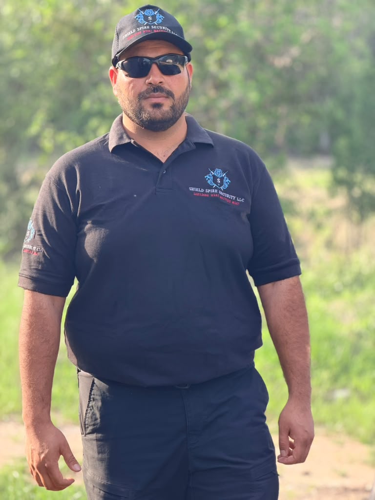 Uniformed Shield Spire Security officer maintaining a professional event security presence on site.