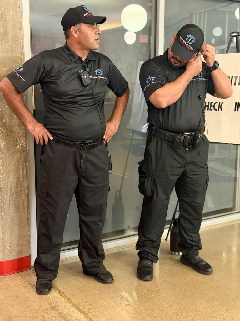 Shield Spire personnel maintaining a professional presence together at their assigned post.